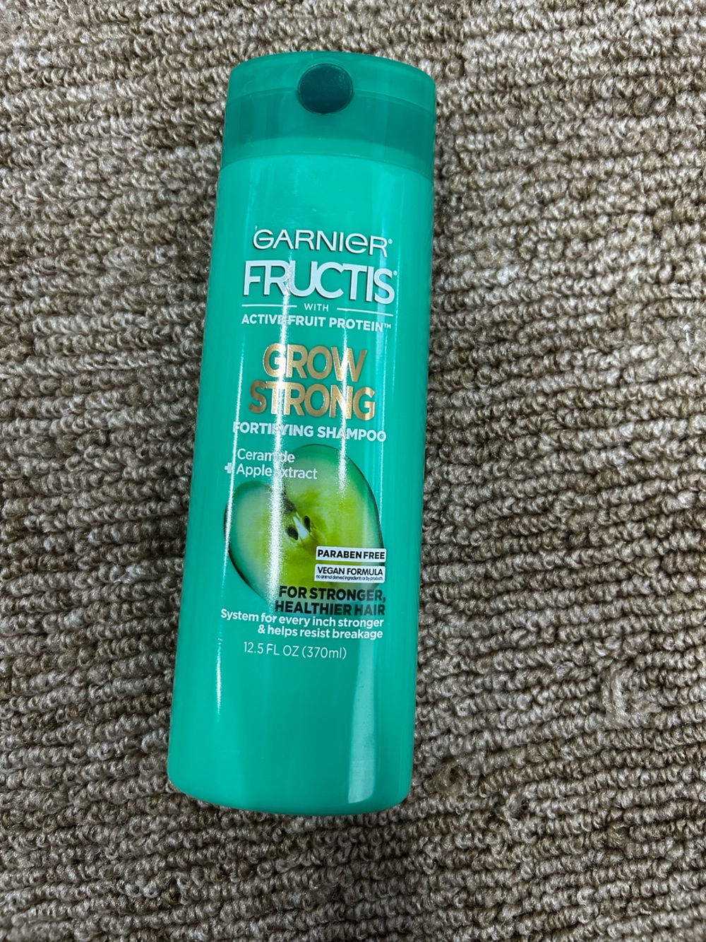 Garnier Fructis Grow Strong Shampoo - Teal Bottle with Green Apple Graphic